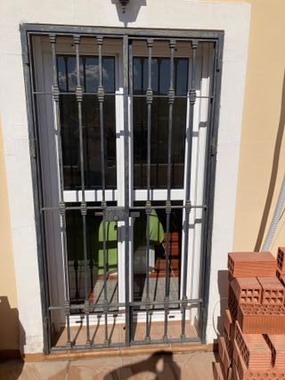 Puerta hierro macizo 2 hojas