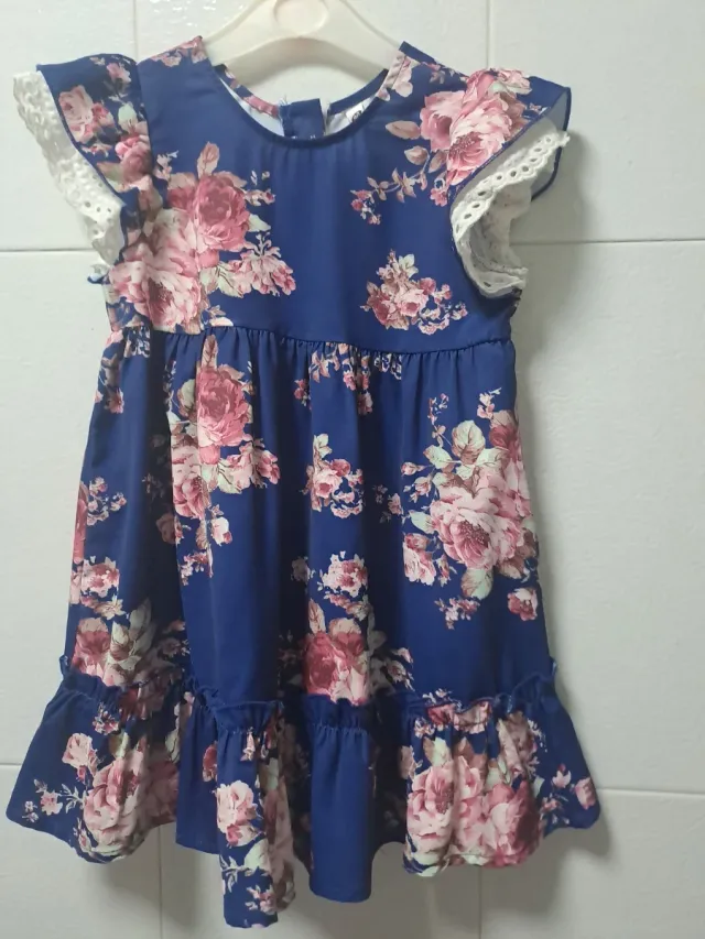 Vestido niña floral azul y camisa rosa