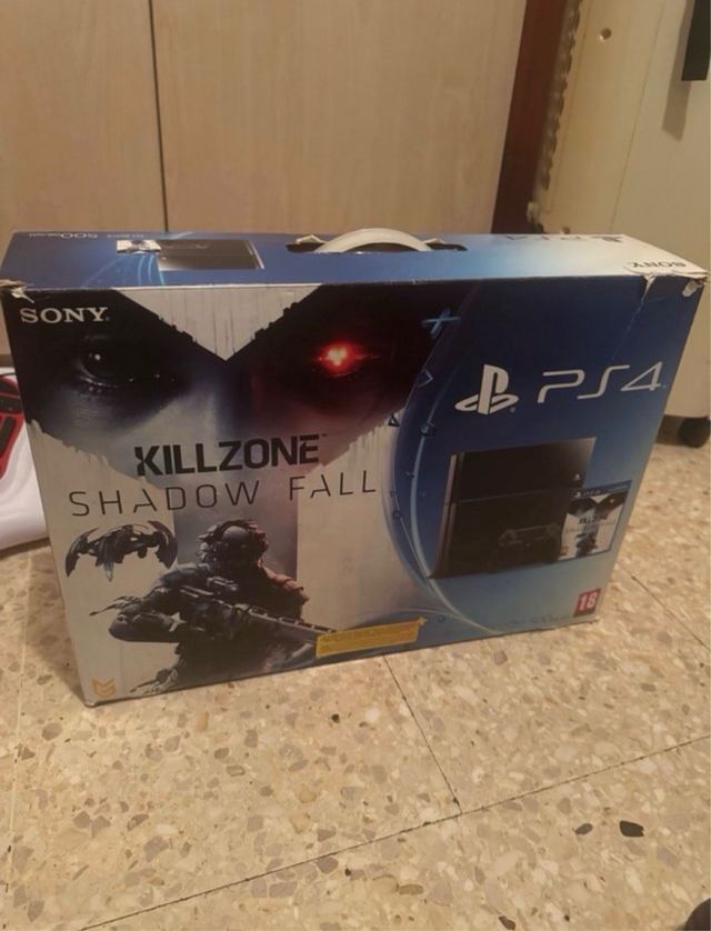 PS4 + Killzone + 7 juegos   y 2 mandos 500gb