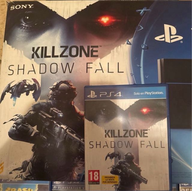 PS4 + Killzone + 7 juegos   y 2 mandos 500gb