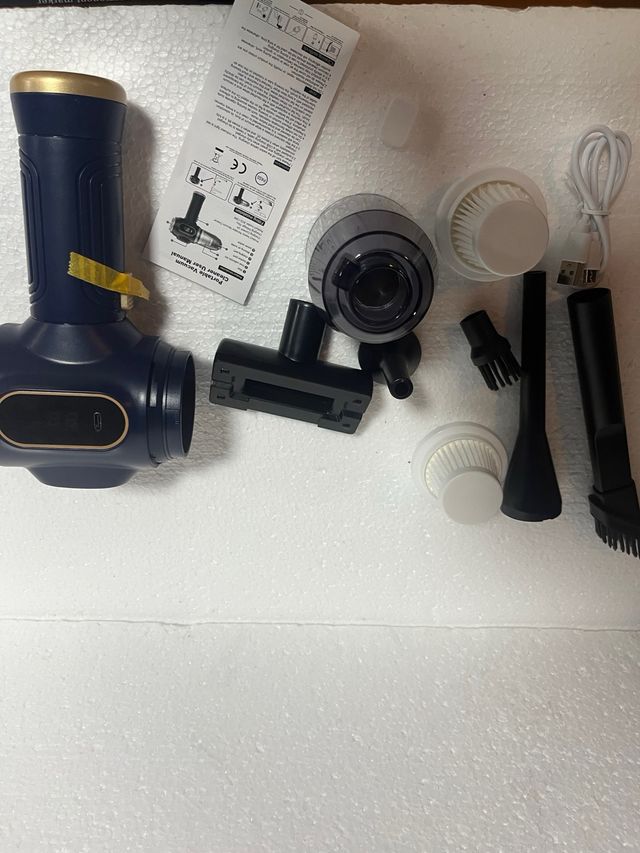 Aspirador plumero portátil coche