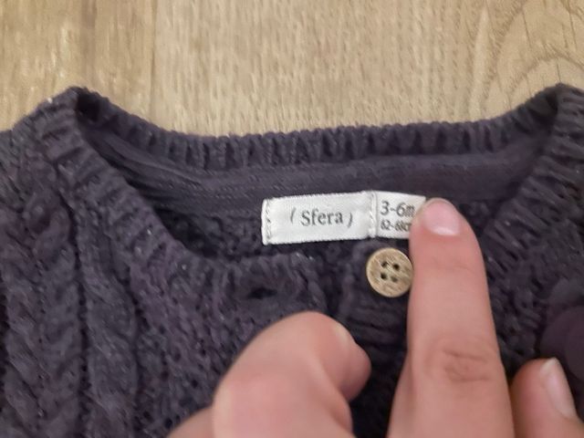 Rebeca bebé morada con flor