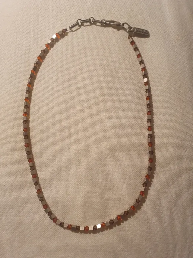 Collar Peccato plata y naranja