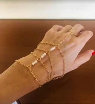 Bracciale-anello dorato con perle