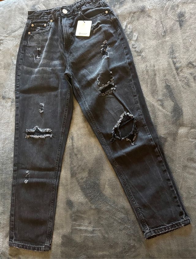 Jeans donna neri strappati