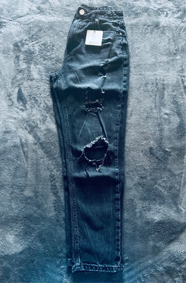 Jeans donna neri strappati