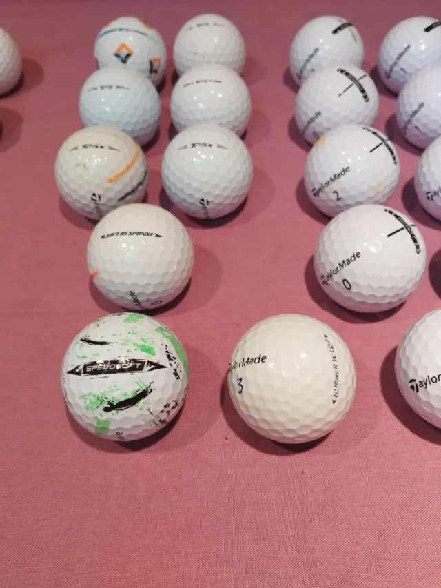 Lote 31 Pelotas Golf marcas Titleist y Taylormade
