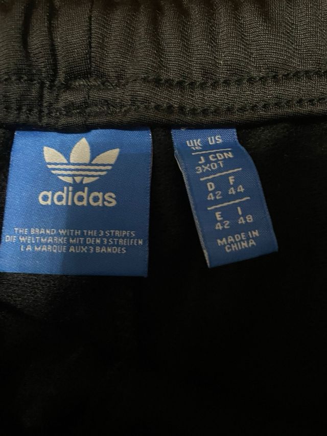 Pantaloni Adidas neri con zip
