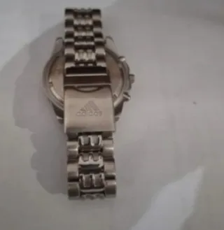 Reloj Adidas Cronógrafo Plata y Negro.