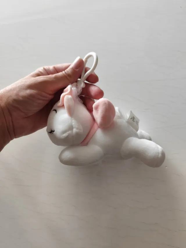 Peluche gatita blanca con lazo rosa