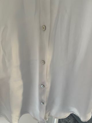 Blusa blanca elegante mujer