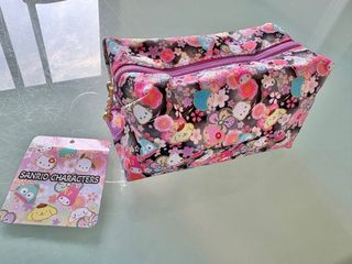 estuche neceser Sanrio kitty pompom pudín japonés