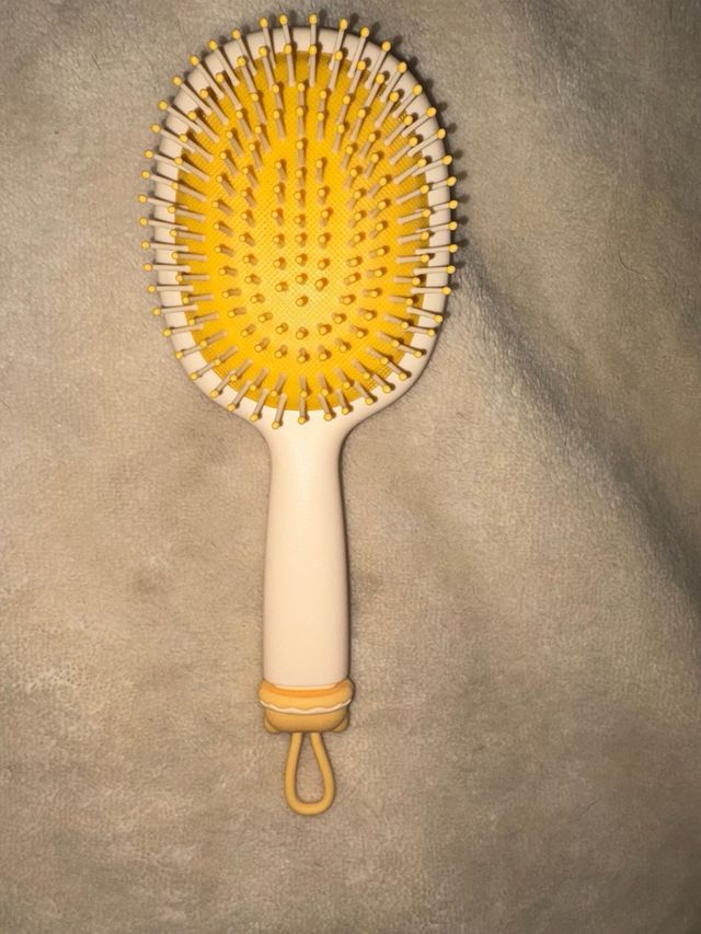Spazzola per capelli in stile anatra beige e giallo