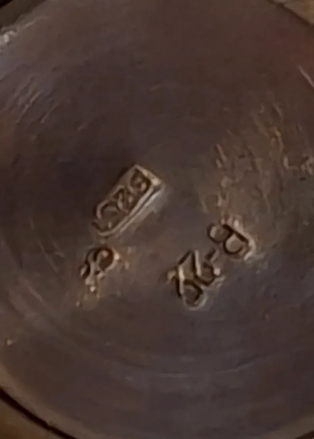 Candelabros de plata con lazo