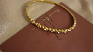 Pulsera Roca con detalles plateados chapada en oro