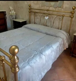 Giro letto in ferro battuto dorato