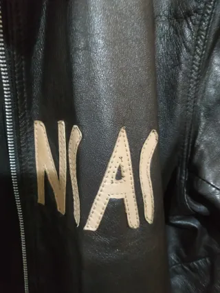 Chaqueta de piel Marrón y beige.