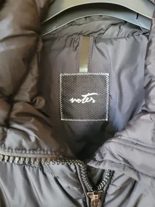 Piumino donna nero lungo con cintura