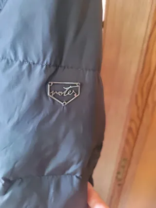 Piumino donna nero lungo con cintura