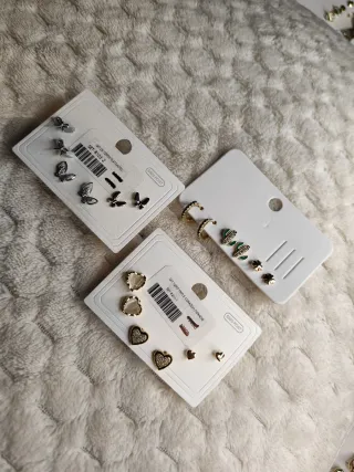 Aros de rodio con cuentas doradas y plateadas