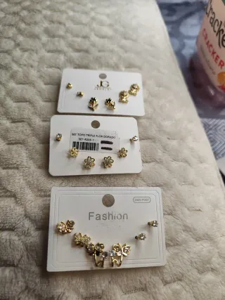 Aros de rodio con cuentas doradas y plateadas