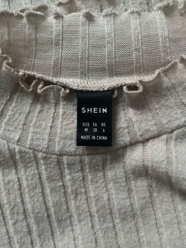 Suéter manga larga beige talla M