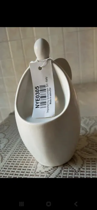 Portacandele Angelo in ceramica bianca.