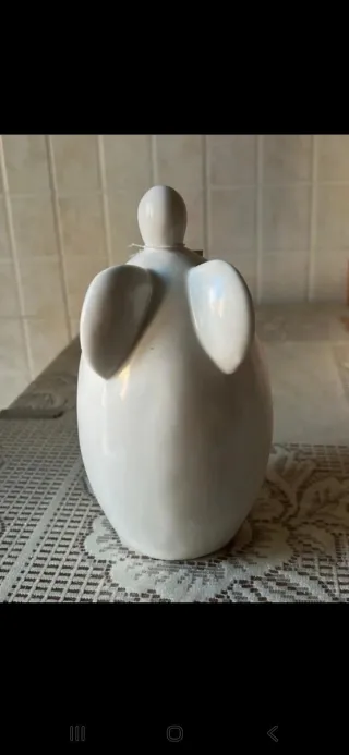 Portacandele Angelo in ceramica bianca.