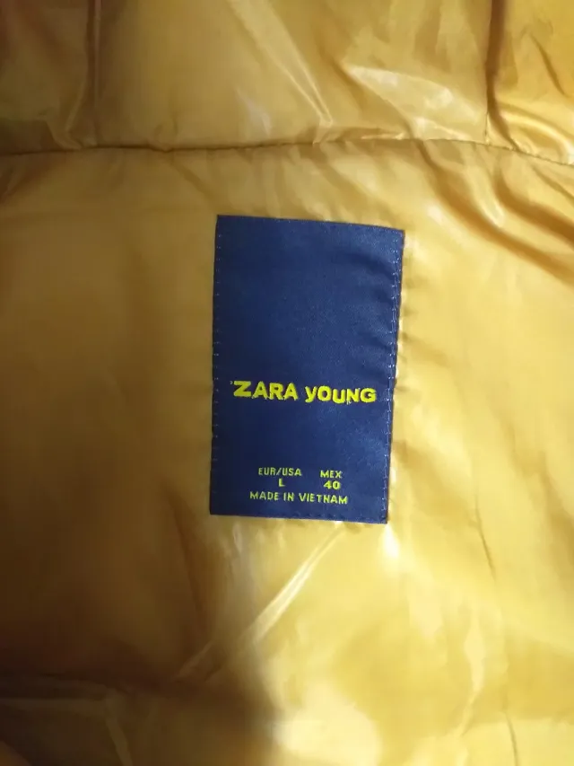 Chaleco de plumas marrón