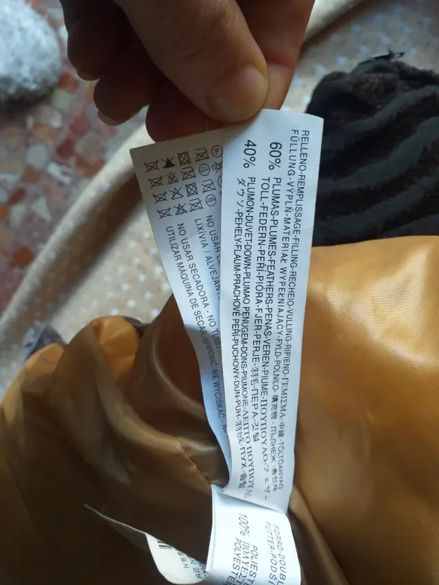 Chaleco de plumas marrón