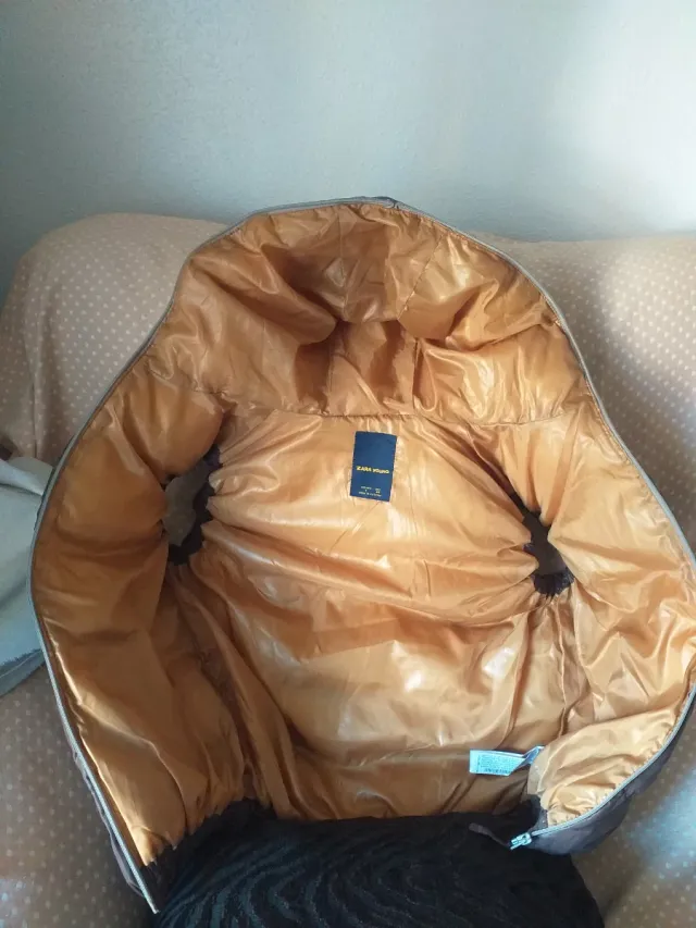 Chaleco de plumas marrón