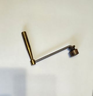 Chiave a manovella antica in bronzo per orologio