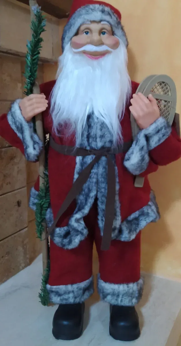 Babbo Natale con bastone e racchette