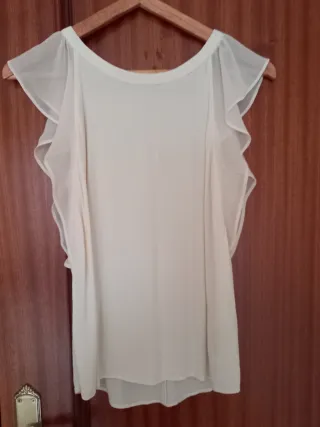 Blusa sin mangas con volantes