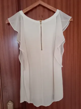 Blusa sin mangas con volantes