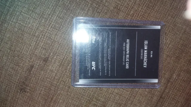 Tarjeta UFC Islam Makhachev Firmada