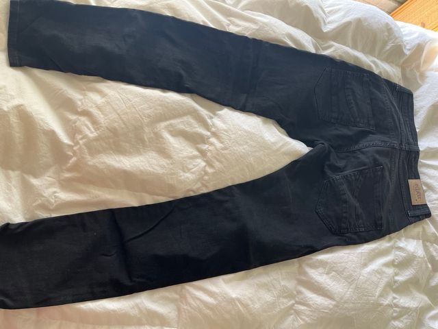 Vaqueros negros marca Please