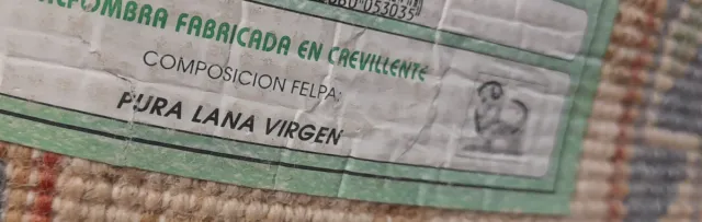 Alfombra de lana virgen roja y beige