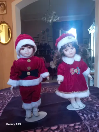 Coppia di bambole vintage in porcellana altezza cm