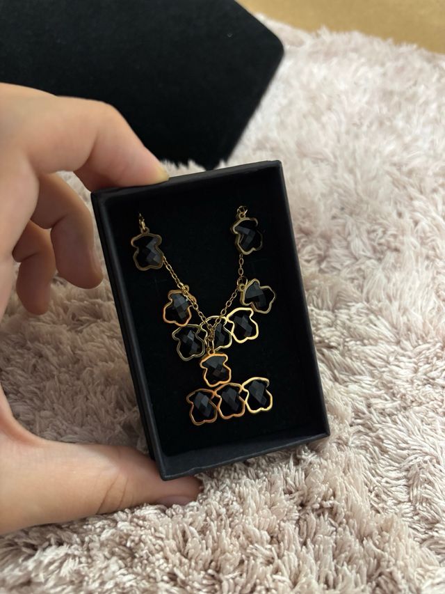 Conjunto tous dorado y negro en acero inoxidable