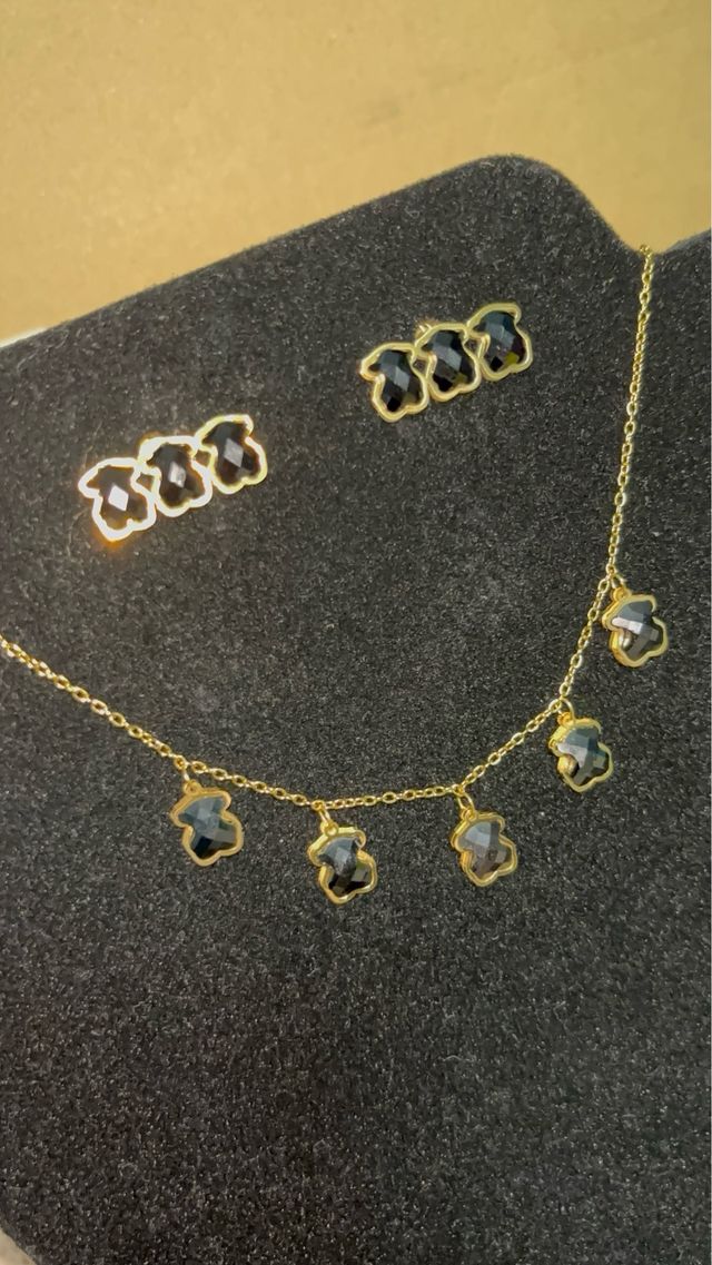 Conjunto tous dorado y negro en acero inoxidable