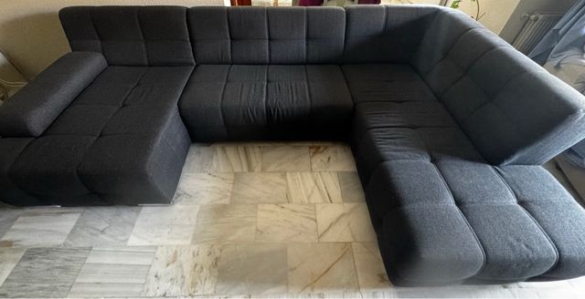 Sofá modular gris 4 plazas/cama.Tres módulos