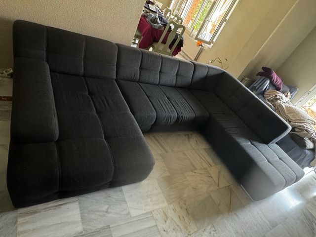 Sofá modular gris 4 plazas/cama.Tres módulos