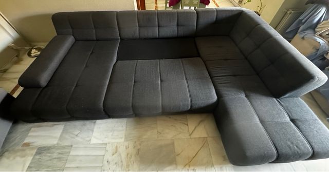 Sofá modular gris 4 plazas/cama.Tres módulos