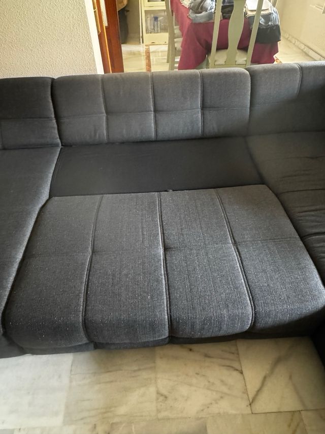 Sofá modular gris 4 plazas/cama.Tres módulos
