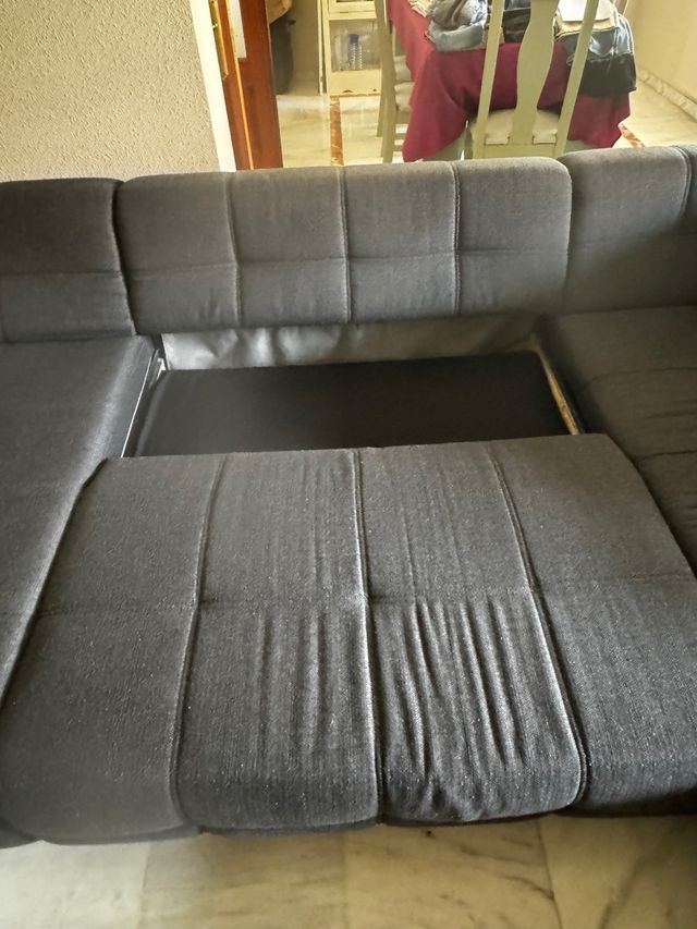 Sofá modular gris 4 plazas/cama.Tres módulos