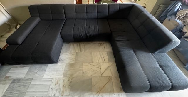 Sofá modular gris 4 plazas/cama.Tres módulos