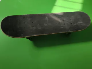 Monopatín Oxelo con protecciones