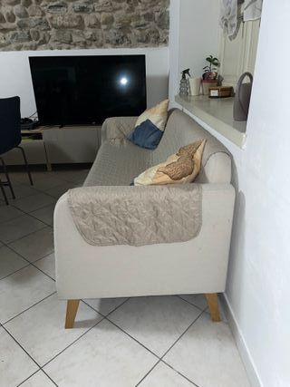 Divano beige in tessuto usato