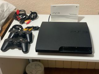 Consola Sony PS3 + 2 Mandos ,Cables ,Una Cámara